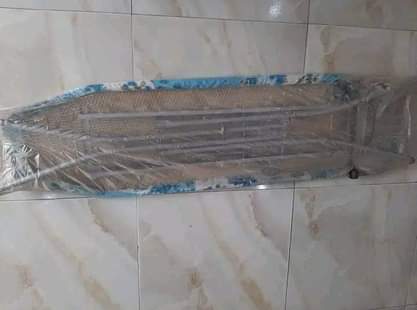 A picture of Cooling fan and ironing board for sale
