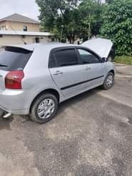 A picture of Toyota corolla obama manual gear Engine Gear and AC in