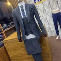 A picture of UG. SHS. 250 000 ONLY YES 250k ONLY SUITS SUITS