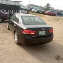 A picture of Clean Kia optima 2010 model For give away price Going