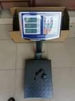 A picture of But computer scale and manual scale