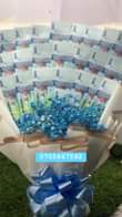 A picture of Money bouquets hampers and fresh flowers