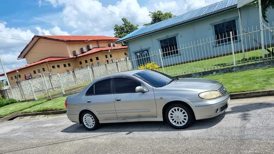 Trini-Ad C.