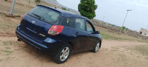 A picture of TOYOTA MATRIX 2003 GOOD ENGINE AND GEAR AC CHILLING AVAILABLE
