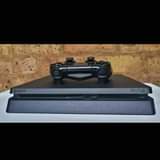 A picture of Playstation 4 slim Full package kwa bei chee kabisa ina