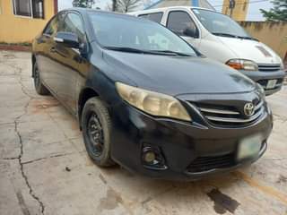 A picture of AWOOF VERY SOUND AND SHARP 2012 COROLLA SELLING LOW 2