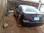 A picture of NIGERIA USED TOYOTA COROLLA BANK TYPE good engine good auto
