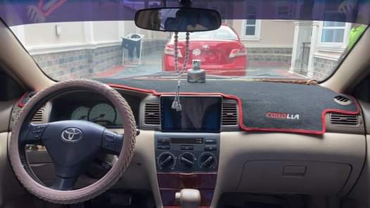 A picture of WOW This is extremely clean Toyota Corolla freshly bath from
