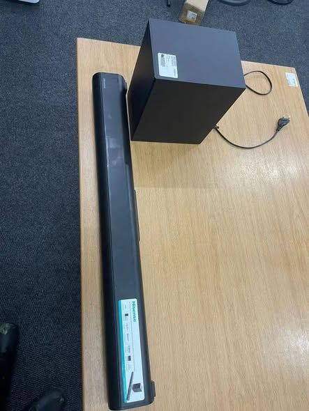 A picture of Hisense speaker bar and woofer