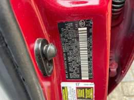 A picture of Pepper red 2010 Corolla Le available Abuja used owner 7m