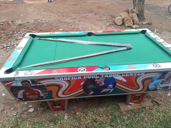 A picture of A NEW POOL TABLE with a slate marble