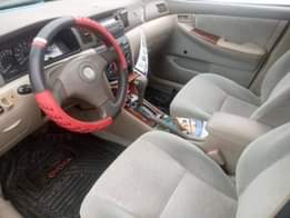 A picture of Dealers market 2004 Toyota Corolla with sound engine gear and
