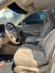 A picture of Registered Toyota Camry 2004 model V4 cylinder engine Interior Clean