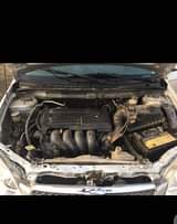A picture of Toyota Corolla le Everything working fine Nothing to fix Buy