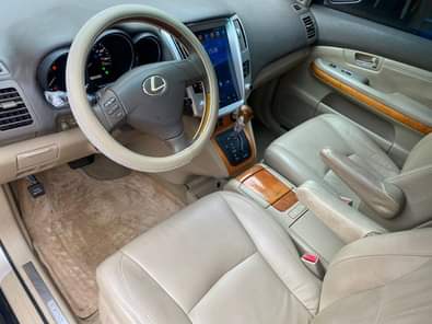 A picture of Few months registered Lexus rx350 2008 9 model Tesla screen