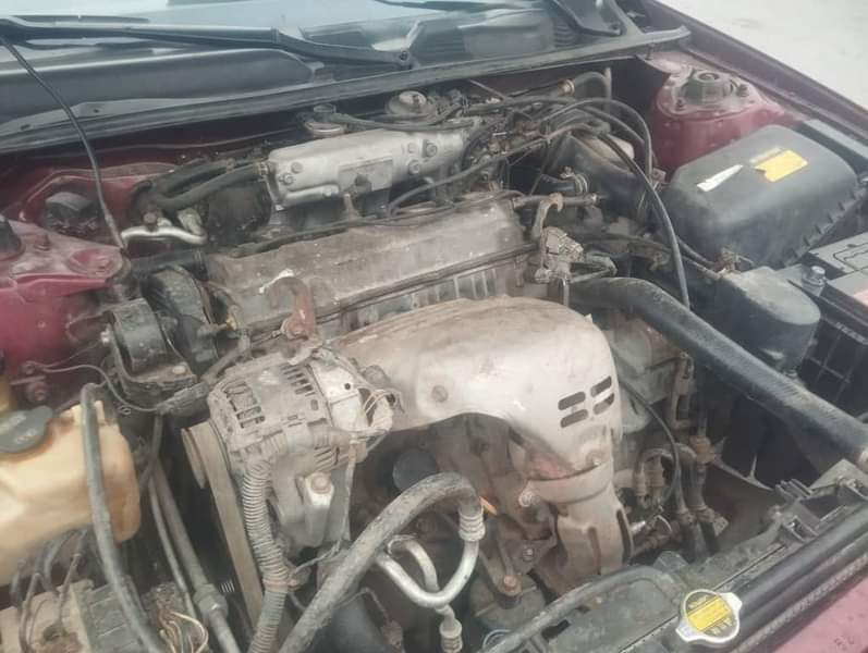 A picture of TINY BIG CAMRY ENGINE TOO GOOD AC NEEDS GAS BODY