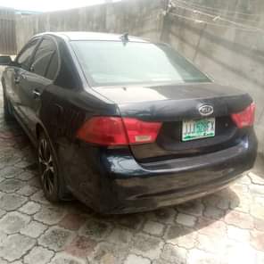 A picture of EZE NONI AUTOS 2009 Kia optima Very sharp Very 100