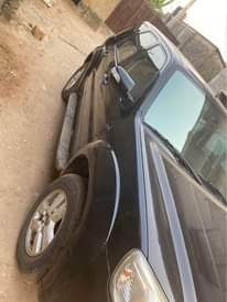 A picture of Ford Escape 2010 Japanese specs four plugs very very low