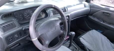 A picture of Toyota Camry envelope clean one with very clean interior engine