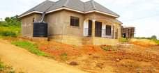 A picture of Quick money needed. 3bedrooms sitting dinning boysquaters. Underground well. 15decimals