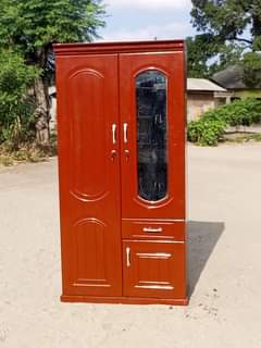 A picture of Nina uza kabat la nguo mbao ngum Bei 235 NZUL