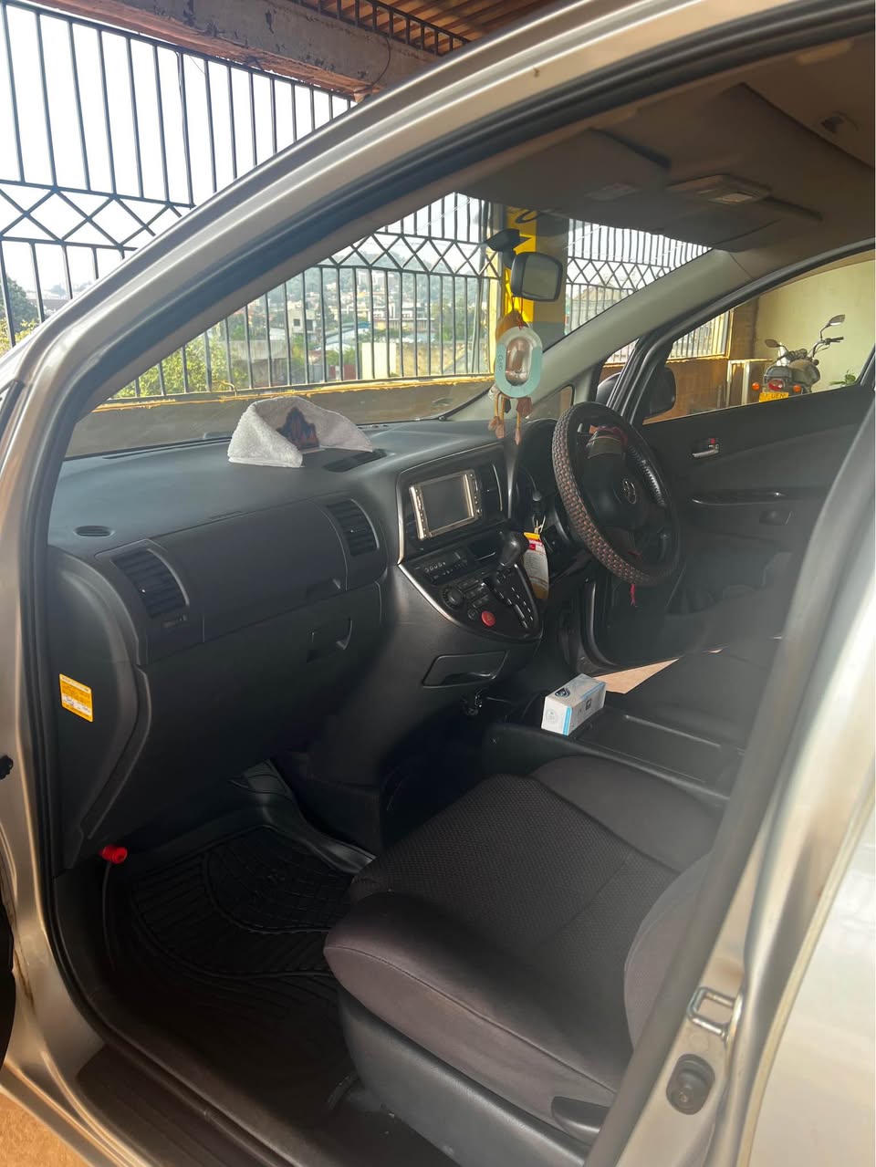 A picture of Toyota wish silver 2007 Contact no 0755855261 Ugx 20 000