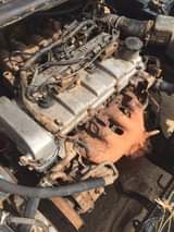 A picture of engine and gear working perfect A C not working price