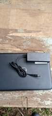 A picture of Dell latitude 3180 Celeron portable laptop at only 450 000