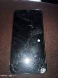 A picture of Iphone 11 pro max 256gb broken screen