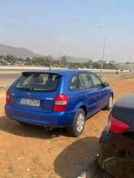 A picture of SUPER SHARP DIRECT 2002 MAZDA 323F with fully paid duty