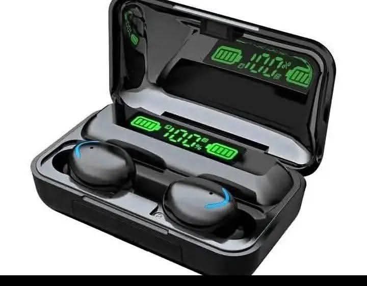 A picture of Laptop head phone and mini router