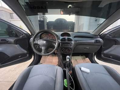 A picture of BELGIUM GRADE PEUGEOT 206 2004 MODEL MANUAL TRANSMISSION AC ENGINE