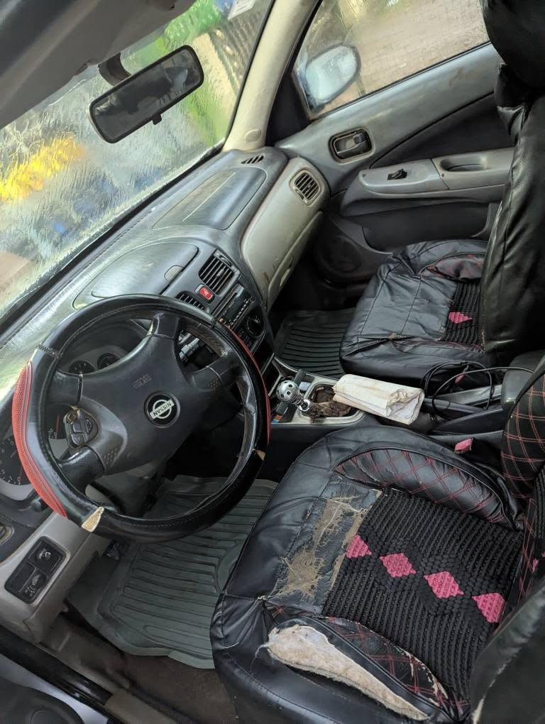 A picture of Nissan Almara 2003 model