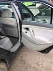 A picture of Neatly used Toyota Camry hybrid 07 with untouched engine gear