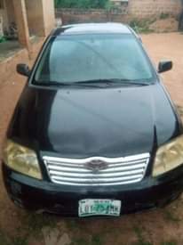 A picture of 2003 model Toyota Corolla bank type