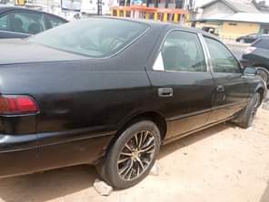 A picture of This car is Toyota Camry aka tiny light Engine sharp