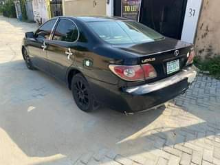 A picture of Partly First body Es300 Lexus 2003 with a very sound