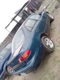 A picture of Oyaooo rush oo Dealers market Toyota Corolla 2000 model Everything