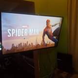 A picture of Sony ps4 standard console with 1 game