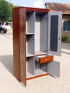 A picture of Nina uza kabat la nguo mbao ngum Bei 235 NZUL