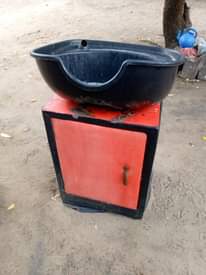 A picture of Dishi la kuoshea nywele