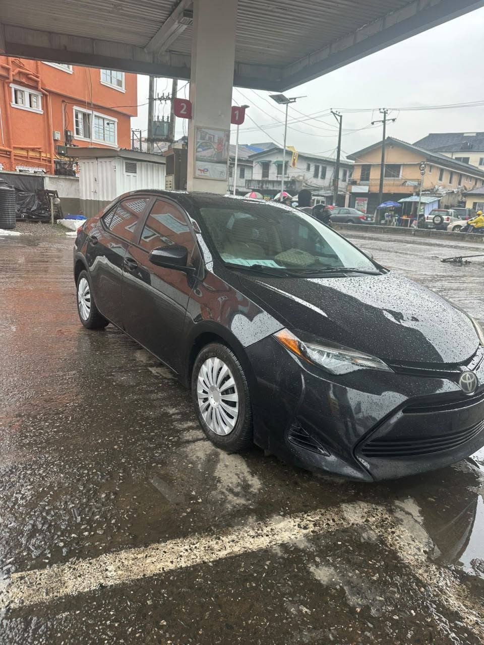 A picture of 2018 accident free Toyota Corolla toks direct but registered last