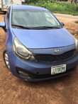 A picture of 2013 Kia Rio bought brand buy and travel everything working