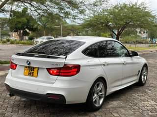 A picture of BMW320i GRANTURISMO EEC ____ BEI 38M TSH Whatsap http wa.me