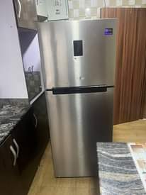 A picture of doble door big fridge and freezer