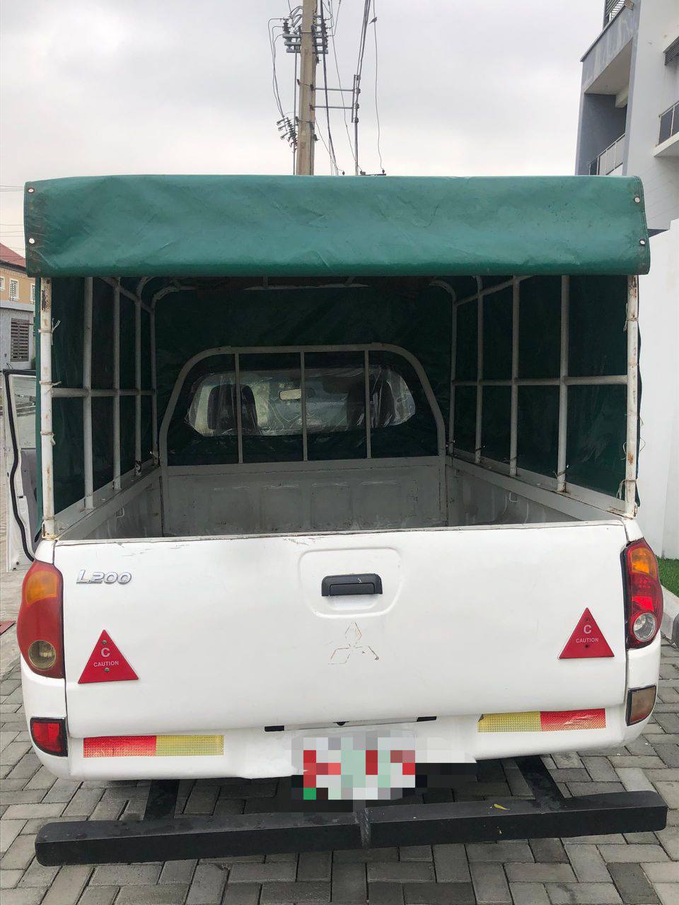 A picture of Mistubishi Hilux 2006 Price 3 3m to owner settlement 300k