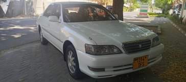 A picture of TOYOTA GX100 BEI MILLION 6 5