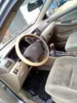 A picture of dealer market Toyota Corolla 2004 model everything is working perfectly