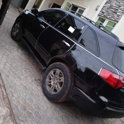 A picture of SUPER HEALTHY ACURA MDX 2009