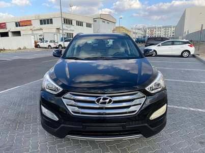 A picture of Hyundai santa Fe 2014 full option gcc specs watsapp 0551513562
